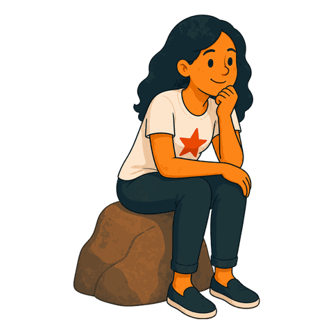 A woman in a white star shirt and blue pants sits on a brown rock resting her chin on her hand.