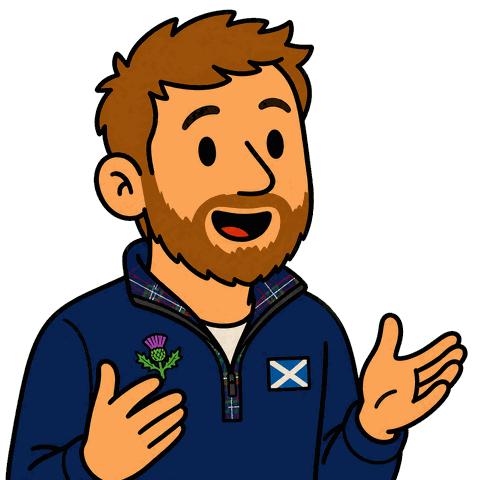 A man with brown hair and a beard wearing a blue half-zip sweater with a Scottish flag and thistle holds his hand up.